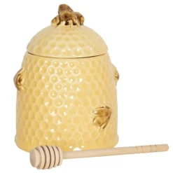 Honingpot met houten lepel geel