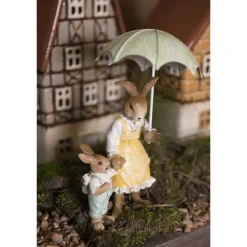 Moeder met kindje en paraplu