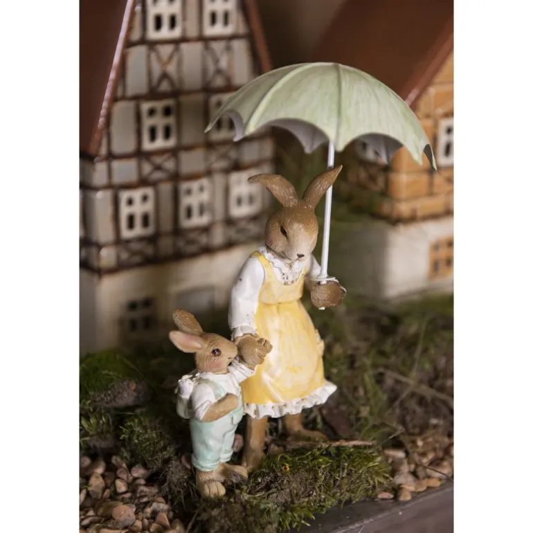 Moeder met kindje en paraplu