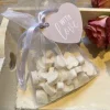 Organza zakje gevuld met mini hartzeepjes With Love