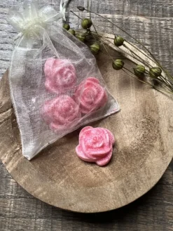 Organza zakje met 4 amberblokjes roos Invicto